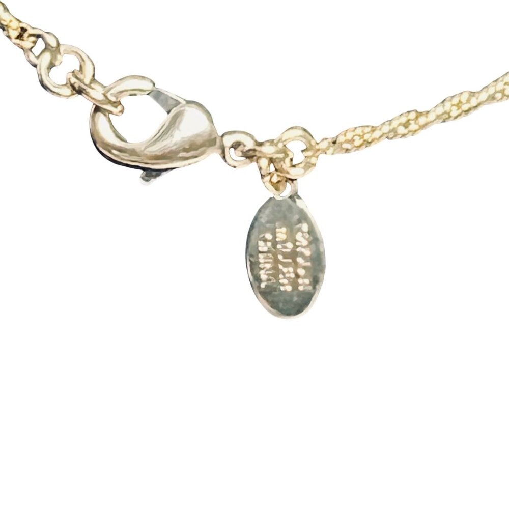 Nolan Miller Gold Tone Rope Chain Necklace With Love Knot Crystal Pendant (6006) - Picture 5 of 6